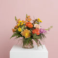 Acacia vase with colorful floral arrangement