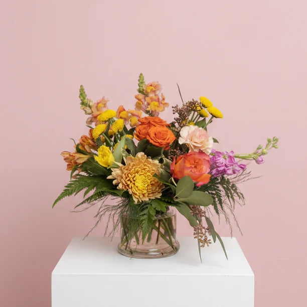 Acacia vase with colorful floral arrangement