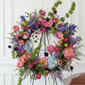 Wildflower sympathy wreath with hydrangeas and roses