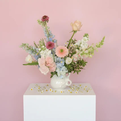 The Pamela fresh flower arrangement in white ceramic pitcher